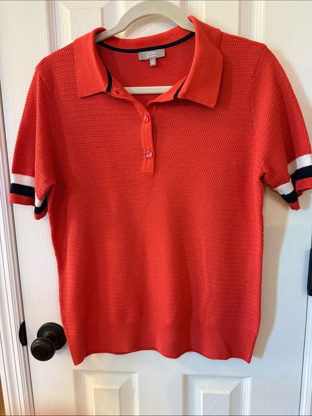 Izod Coral Short-Sleeve Women’s polo with Striped Cuffs